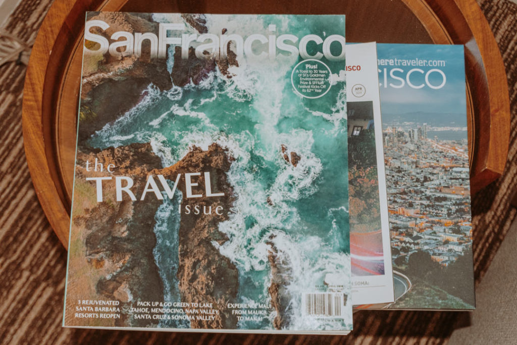 Travel magazines on wooden table at Park Central San Francisco