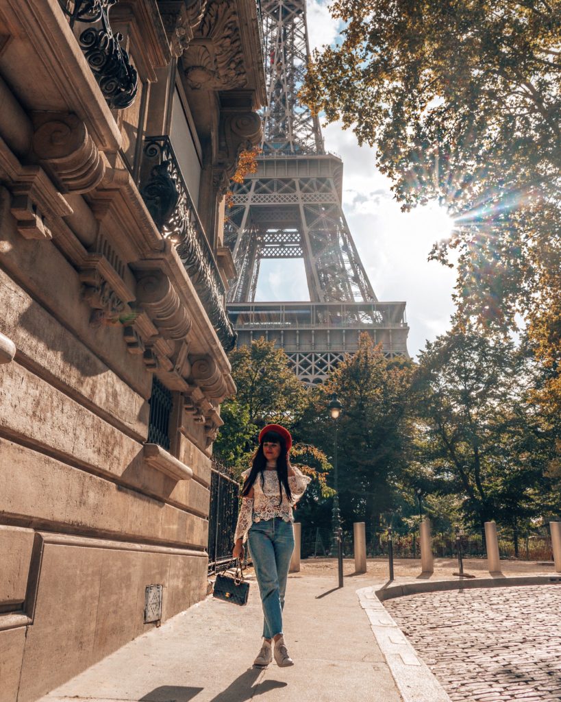 Woman Walking by Eiffel Tower
