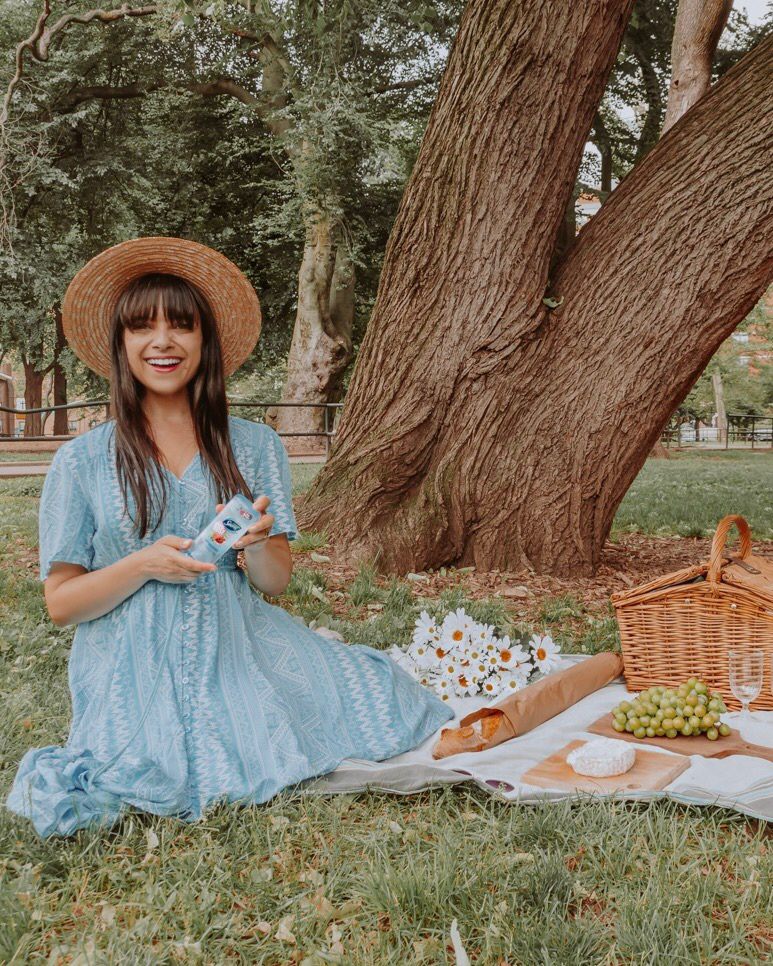 Woman in blue dress at picnic