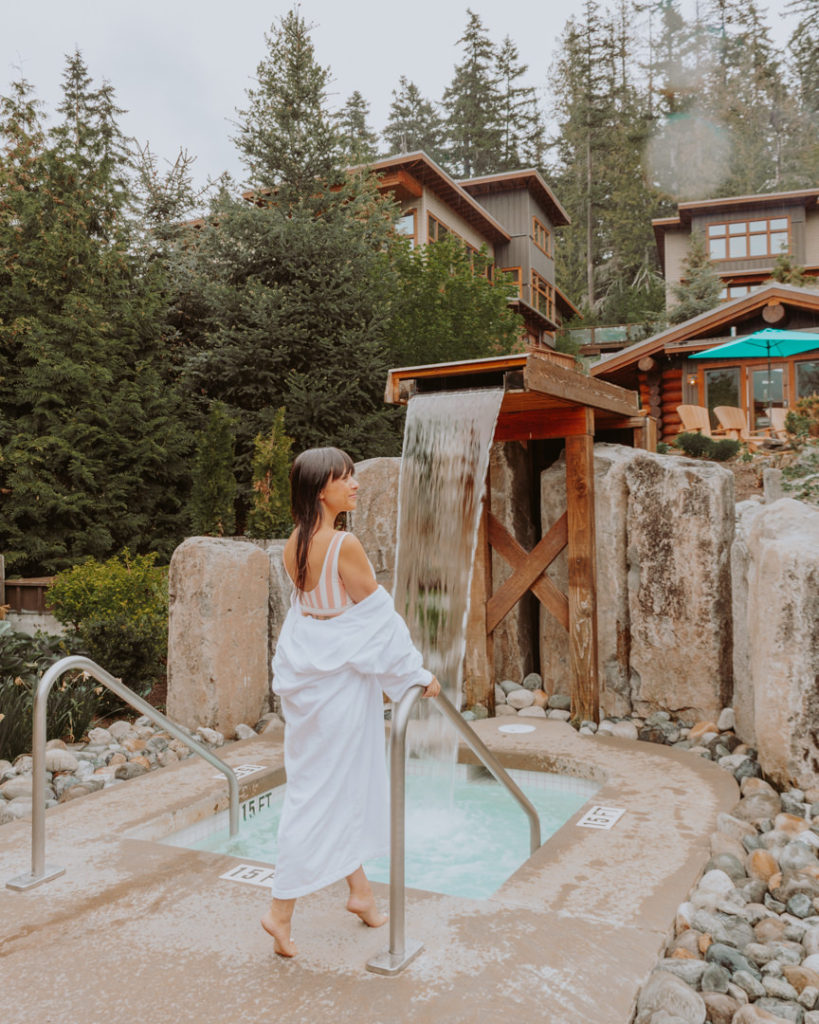 woman in white robe at outdoor spa